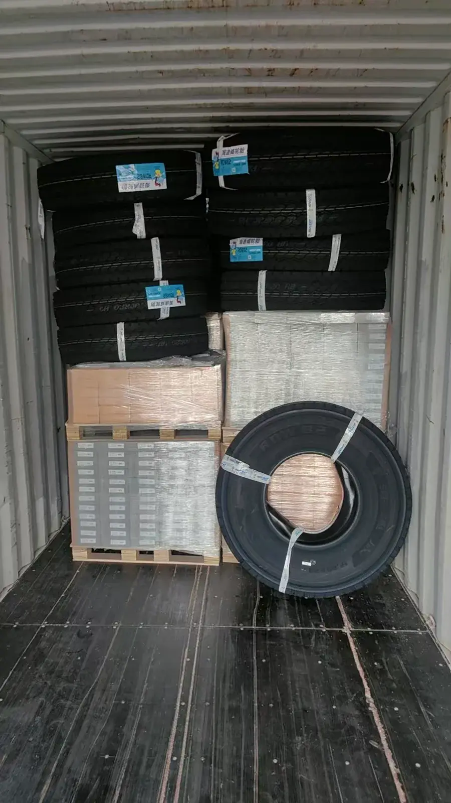 Mixed TBR tire and package loading inside a container